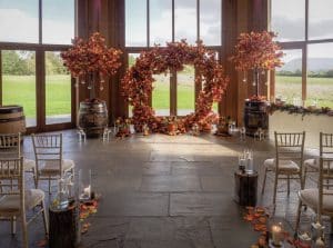 Autumn wedding, autumn moongate, autumn tree, barrels, logs , wooden logs, ceremony